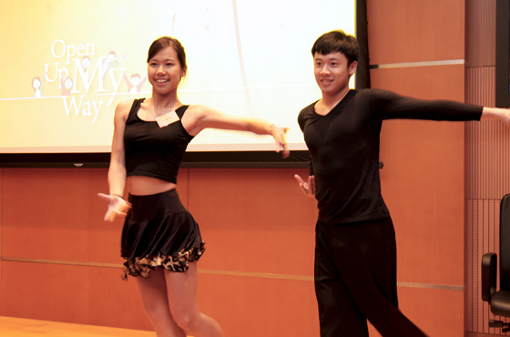 Jasmine (left) giving dance performance during the FIFE Fund Presentation Ceremony and Experience Sharing.